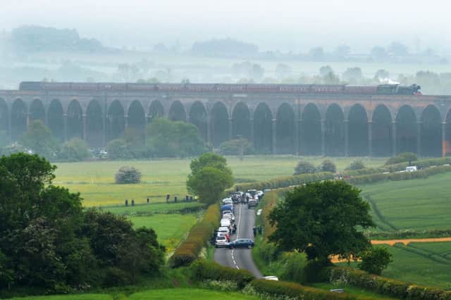 The Flying Scotsman travels over the Harringworth Viaduct in the mist.
PICTURE: ANDREW CARPENTER