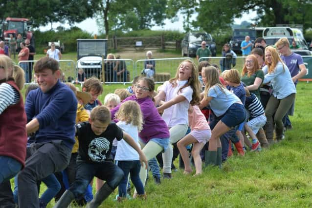 Youngsters take part in the tug of war.
PICTURE: ANDREW CARPENTER