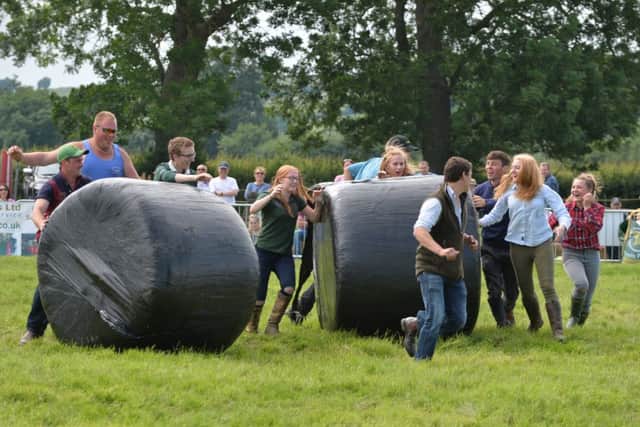 Fun during the bale rolling event.
PICTURE: ANDREW CARPENTER