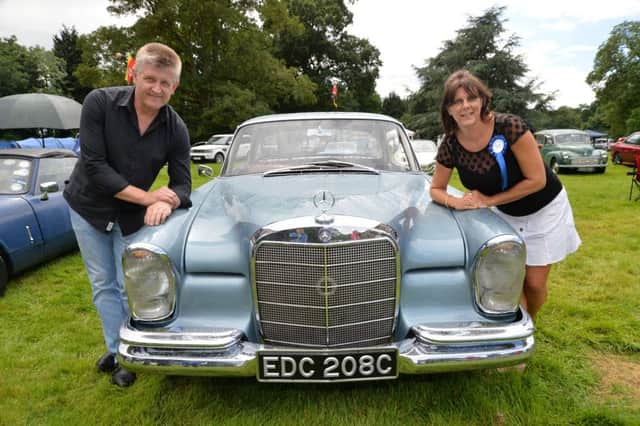 Mark Dwyer and Nikki Dino take first prize with their 1965 220 SEB mercedes.
PICTURE: ANDREW CARPENTER