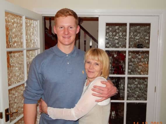 Ben Mullis with his mother Angela.