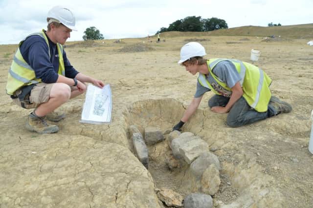 Dan Connor and Duncan Macer of Allen Archaeology with the oven found at the Linden Homes Lubenham Hill site.
PICTURE: ANDREW CARPENTER NNL-160726-195857005