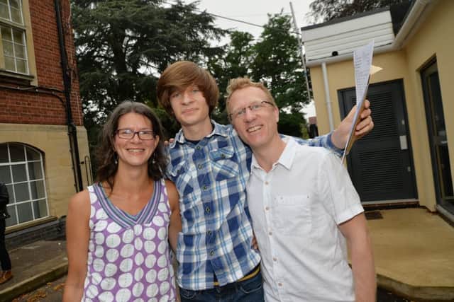 Ethan Blair celebrates with his parents Daniella and Adam.
PICTURE: ANDREW CARPENTER