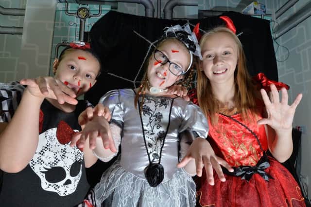Spooky...centre, Madi Brooks 11 with sisters Amelia 9 and Lorna 14 during the halloween party at gallones.
PICTURE: ANDREW CARPENTER