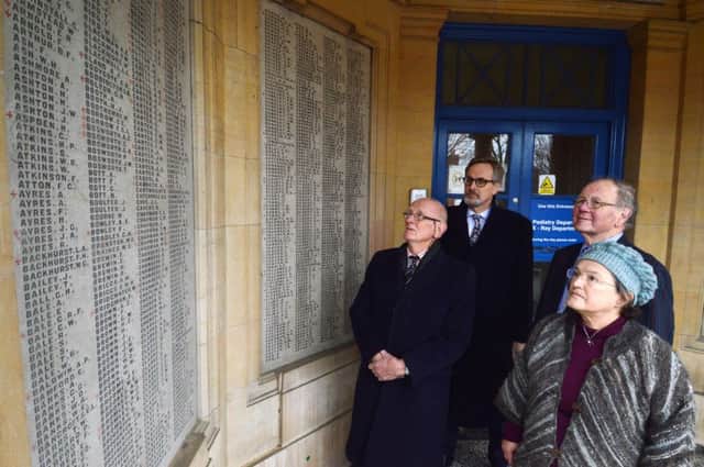 Denis Kenyon, Mark Robinson chairman, Brian Tanner civic society and Rosalind Willatts inside the Cottage Hospital War Memorial.
PICTURE: ANDREW CARPENTER
