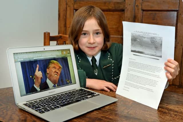Henrietta Watson 10 with her climate letter to Donald Trump.
PICTURE: ANDREW CARPENTER