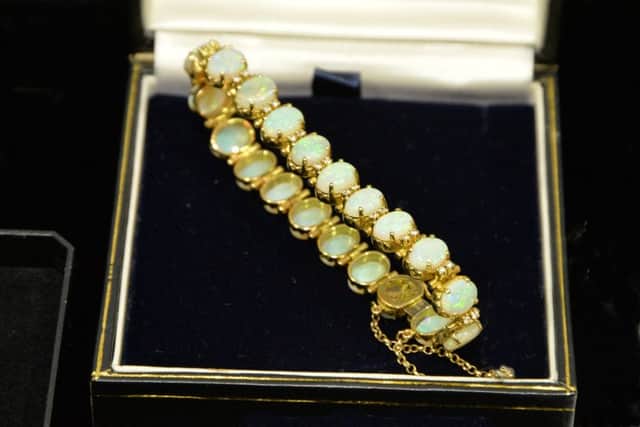 An opal and diamond bracelet Â£300 - Â£500.