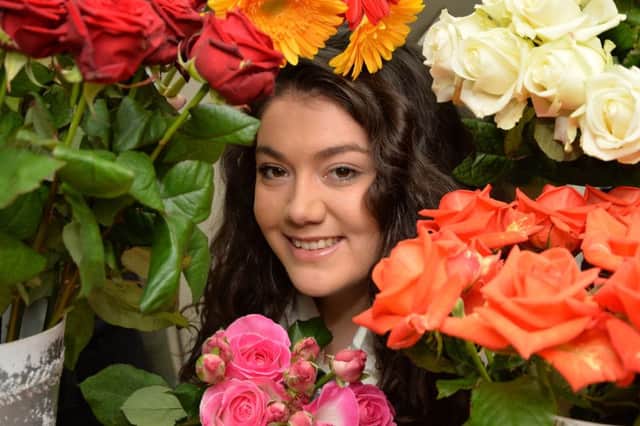 Blooming lovely...Emma Swain (22) is the new owner of Whites the florist in Lutterworth.
PICTURE: ANDREW CARPENTER