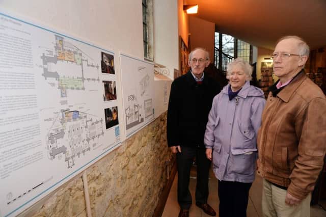 Visitors take a closer look at the St Dionysius church Â£750,000 project on display.
PICTURE: ANDREW CARPENTER