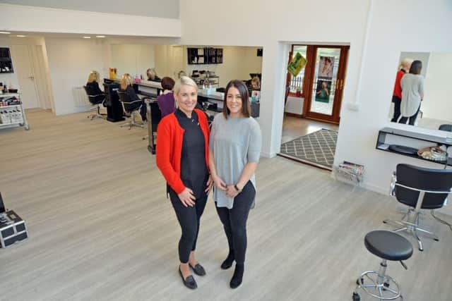 Holly Brown and Lottie Court of Manor Hair & Beauty.
PICTURE: ANDREW CARPENTER