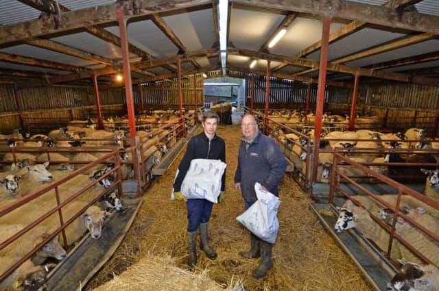 Craig Langton with son Jack at Manor farm in Burton Overy.
PICTURE: ANDREW CARPENTER