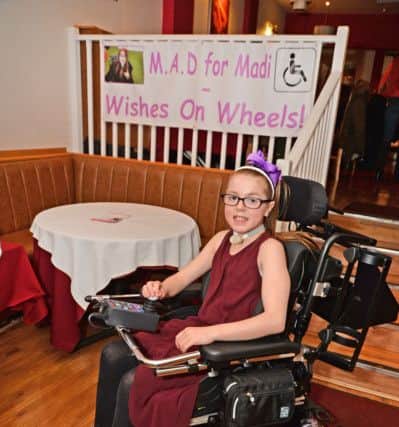 Joy...Madi Brooks with her new wheel chair.
PICTURE: ANDREW CARPENTER