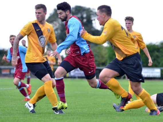 Nick Pollard has urged his Harborough Town players to push for the highest league position possible
