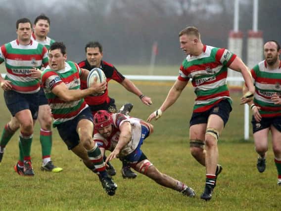 Lutterworth, pictured in action against Wellingborough earlier this season, edged a narrow win at the weekend