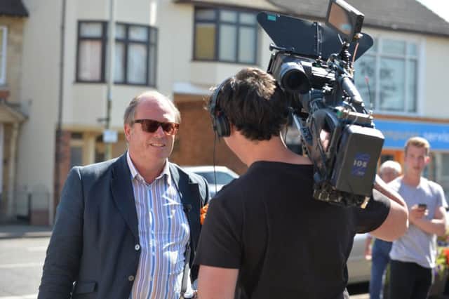 Expert James Braxton and Director Joe Sharp outside Harborough Antique Centre during filming.
PICTURE: ANDREW CARPENTER