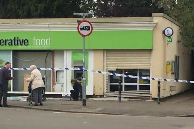 The damaged Co-op and cash machine in Crick, Northamptonshire, this morning.