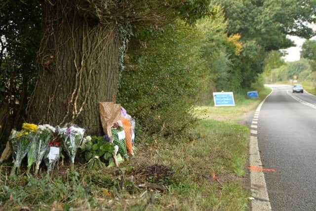 Flowers left at the scene of the Dingley crash where two workers from Fairline died NNL-140110-120501001