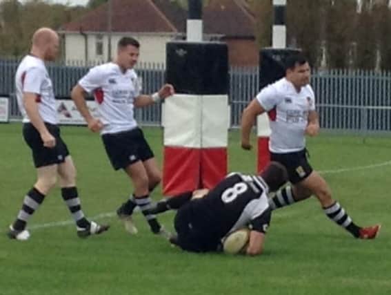 Ethan Godefroy crashes over for Harborough's first try