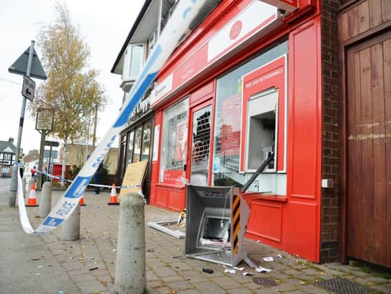 The damaged Post Office and cashpoint. Photo by ANDREW CARPENTER