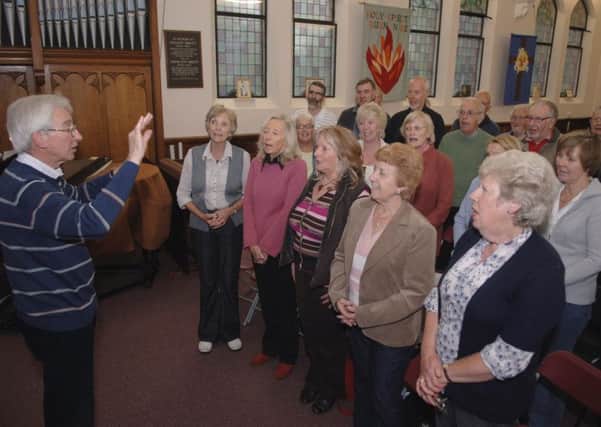Hitting the right notes...Alan Baraclough conducts Lutterworth Choral Society during their rehearsal at Lutterworth Methodist church. (Picture: Andrew Carpenter/001335-71)